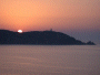 Sunset over Revellata lighthouse as viewed from Calvi